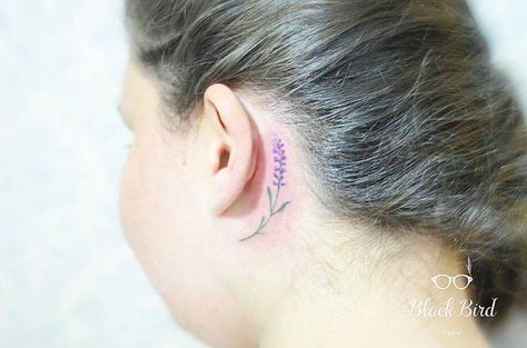 Beautiful Floral Tattoos Behind The Ear Flower Tattoo Ear, Eva Tattoo, Delphinium Tattoo, Purple Flower Tattoos, Tattoo Therapy, Lilac Tattoo, Grace Tattoos, Behind Ear Tattoos, Hp Tattoo