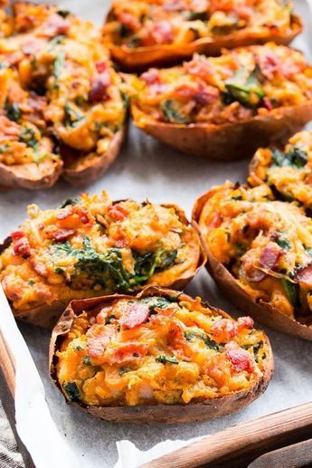 These twice baked sweet potatoes can be served as a healthy meal or side dish - your choice! They're packed with a savory mixture of caramelized onions, spinach and bacon and baked to perfection. They're family approved, Paleo, Whole30 compliant, and dairy-free. Paleo Running Momma, Spinach And Bacon, Twice Baked Sweet Potatoes, Lunch Saludable, Baked Sweet Potatoes, Sweet Potato Skins, Pasti Sani, Paleo Diet Recipes, Twice Baked