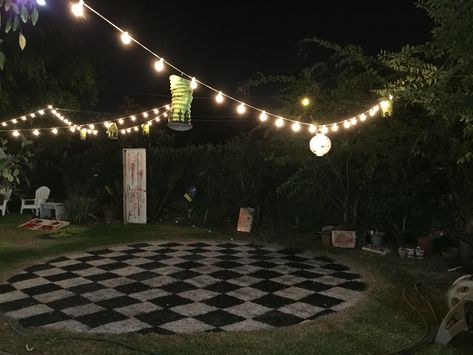 Dance Floor Idea: Not checkered, but painted to designate.  Maybe place plant hangers with lights on the edges? Diy Checkered Dance Floor, Halloween Party Dance Floor, Halloween Dance Floor, Grass Dance Floor, Checkered Dance Floor, 70s Theme Party, Wedding Diys, 70s Theme, Dance Floor Wedding