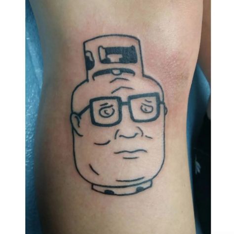 Funny Tattoos For Men Hilarious, King Of Hill Tattoo, Ditch Tattoos Men, King Of The Hill Tattoo Flash, Gary Tattoo Spongebob, Hank Hill Tattoo, Mr Poopybutthole Tattoo, Simple Cartoon Tattoos, Bobby Hill Tattoo