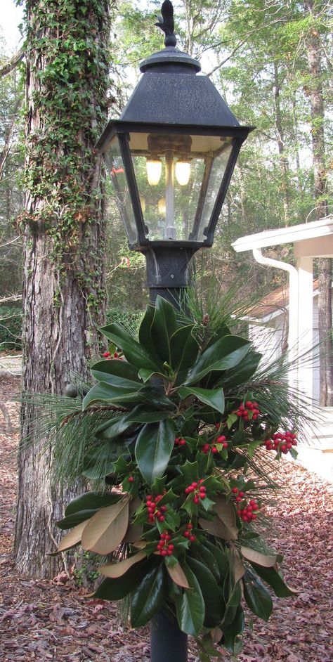 gas lamp with fresh greenery- by me! Beautiful! We visited the south one November and brought back magnolia leaves, pine cones, and other clipping and I had such fun decorating with them. Southern Christmas, Post Lanterns, Christmas Planters, Magnolia Leaves, Christmas Decorations Diy Outdoor, Festival Diy, Christmas Projects Diy, Christmas Porch, Diy Lamp