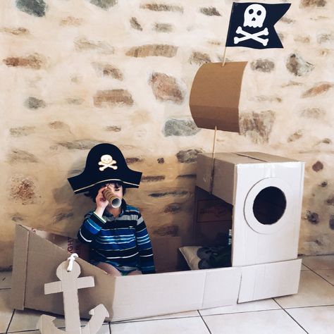 Ship Cardboard, Cardboard Boxes Kids, Cardboard Pirate Ship, Cardboard Boat, Cardboard Play, Large Cardboard Boxes, Stick Family, Blowing Up Balloons, Cardboard Box Crafts