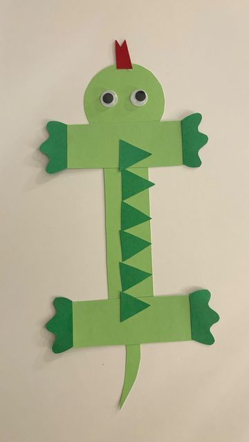 Mel  |  Early Childhood Educator on Instagram: "“I” is for Iguana 🦎🦎

Follow @artsandcrafts4kids for more deas! 🌟
.
.
.
#sensoryactivities #artsandcrafts #diyartsandcrafts #activitiesforkids #kidsactivities #earlychildhoodeducation #playlearningideas #alphabet #iguana" I Is For Iguana Craft, G Preschool Crafts, I For Iguana Craft, Iguana Crafts For Preschoolers, Letter G Activity For Preschoolers, Iguana Handprint Craft, I Is For Iguana, G Crafts For Toddlers, E Activities For Preschool