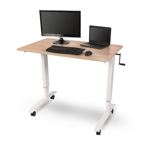 PRICES MAY VARY. Spacious and versatile desktop; leave it flat for a simplicity, or accessorize with ergonomic add-ons like a monitor shelf, keyboard tray, pencil drawer, and more Hand crank height adjustment is simple, strong, and durable; crank can be positioned on front or either side of desk Features smooth-rolling, lockable casters for mobility Overall dimensions are 47.25" W x 29.5" D x 32.5" to 48.5" H (with included 3" casters installed); max weight capacity is 154 lbs; BIFMA certified f Rolling Standing Desk, Office Under Stairs, Mobile Standing Desk, Rolling Desk, Electric Standing Desk, Standing Table, Adjustable Height Standing Desk, Stand Up Desk, Simple Desk