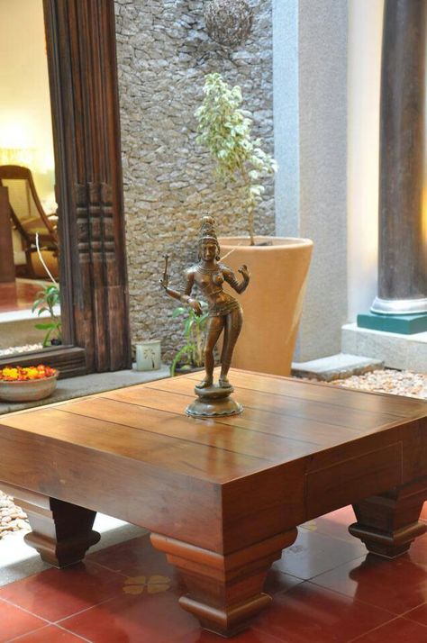 Brass Statue done right. Single piece on teak wood centre table. Let the Work speak for itself without a profusion of nick knacks .. Modern Centre Table, Modern Centre Table Designs, Centre Table Design, India Home Decor, Indian Interiors, Indian Home Interior, Ethnic Home Decor, Centre Table, Furniture Design Wooden