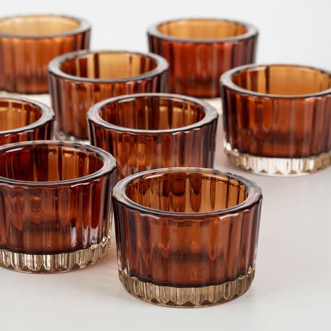 PRICES MAY VARY. Match Size：Tealight candle holder set includes 12 glass candle holders, each small size is 2" x 1.5". Fits tea lights, small LED lights and votives less than 1.96" in diameter and less than 1.5" in height. Vertical Appearance:The classic ribbed surface not only enhances the beauty of the glass candle holder, but also allows for a softer and more charming candlelight inside, adding a layer of warmth to your life Thicker Glass:Votive Candle Holders made of high quality glass, thic Amber Candle Holders, Votive Candles Wedding Centerpiece, Witchy Wedding Centerpieces, Amber Candle Jars, Fall Wedding Centerpieces Round Table, Amber Bud Vases, Centerpieces Boho Wedding, Terracotta Wedding Decor, Small Table Centerpiece