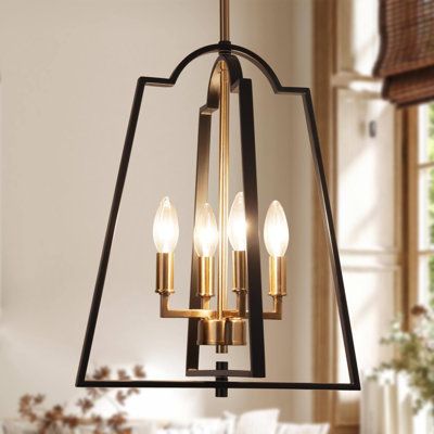 Introduce a modern but classic lantern appeal to your home with this glamorous 4-light chandelier. The stunning combination of matte black and dark gold finish highlights its open lantern frame and makes it an impressive art piece for your space. Four gold candle-shaped bulb sockets made of premium metal add a sense of traditional charm that can go well with your modern or farmhouse decor. | Everly Quinn Marval 4-Light Lantern Classic Chandelier Metal | 17.5 H x 14 W x 14 D in | Wayfair Chandelier Above Tub Bathroom, Black And Brass Chandelier Entryway, Small Black Chandelier Bathroom, Black Semi Flush Ceiling Lights, Black Entryway Light Fixture, Bronze Kitchen Light Fixtures, Black And Gold Pendant Light Kitchen, Black And Gold Light Fixture, Light Over Bathtub