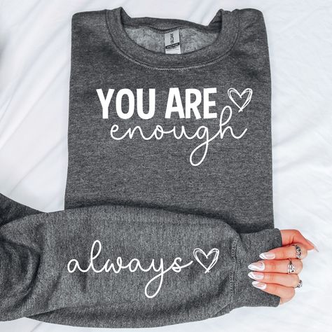 You Are Enough Sweatshirt, Mental Health Sweatshirt, Positive Sweatshirt, Self Love Sweatshirt, Positive Saying Sweatshirt, Positive Quotes 🌾Welcome to "Boutique Grace store"... I will be presenting sweatshirt, which are indispensable for your autumn and winter days, with special and different designs in my store.🌾 🌾Product Features ✔️Gildan® Heavy Blend™ Unisex Sweatshirt  ✔️50% Cotton / 50% Polyester ✔️Preshrunk fleece knit ✔️Classic Fit ✔️ Air jet yarns = softer feel and reduced pilling ✔️ Motivational Clothing, Graduation 2024, Love Sweatshirt, Cricut Craft, Cricut Craft Room, You Are Enough, Winter Days, Quotable Quotes, Winter Day