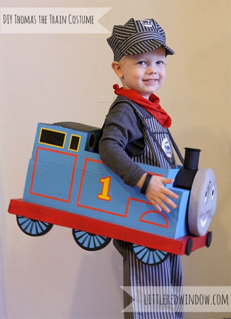 Super adorable DIY Thomas the Train Halloween Costume made from a cardboard box! from Little Red Window Percy Train Costume, Diy Thomas The Train, Thomas The Train Costume, Cardboard Box Costume, Cardboard Train, Halloween Doors, Train Costume, Thomas Party, Thomas The Train Birthday Party