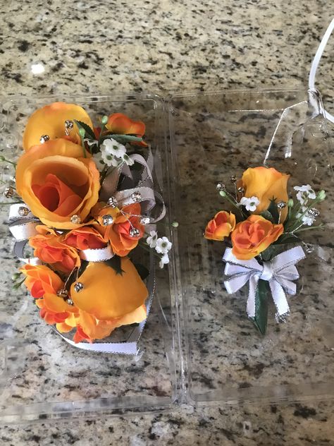 Orange And White Corsage And Boutonniere, Orange And White Boutonniere, Prom Flowers Corsage Orange, Orange And White Corsage, Orange Flower Corsage, Prom Flowers Bouquet Orange Dress, Orange Prom Corsage, Orange Hoco Couple, Orange Prom Flowers