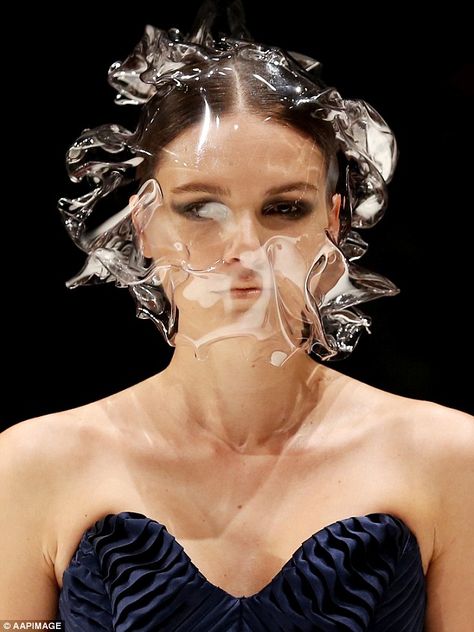 Environmentally unfriendly: A selection of models charged down the runway in masks and headpieces that looked remarkably like #sheets of #plastic blowing against their faces Vanessa Moe, Body Adornment, Futuristic Fashion, Recycled Fashion, Textiles Fashion, Plastic Bags, Headdress, Wearable Art, Headpiece