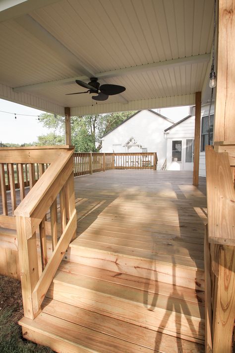 Interior decorator and home blogger Liz Fourez shares everything you need to know about staining a deck from prep to finish! Double Wide Home Interior, Back Porch Ideas For Entertaining, Wooden Back Porch Ideas Decks, Natural Deck Stain Ideas, Porch Decking, Close In Deck Ideas, Back Porch Building Ideas, Manufactured Home Remodel Porch, Wood Back Porch Decks