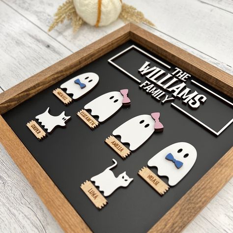 Our Personalized Ghost Family Sign is the perfect spooky addition to your home during the Halloween season! This unique and eye-catching sign is designed to add a touch of eerie charm to your decorations while showcasing the spirit of your family!Each sign is laser cut and handcrafted to order! Choose from 4 different frame colors!Each sign can include up to 8 ghosts! Please be sure to include your last name and the name/style for each piece in the personalization box!This sign is freestanding a Eek Signs For Halloween Diy, Ghost Fall Decor, Spooky Season Sign, Halloween Glowforge Projects, Halloween Decor Signs, Fall Laser Cut Decor, Laser Cut Halloween Decor, Cricut Halloween Decor, Halloween 2024 Decoration