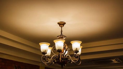 The Easiest Ways to Spruce Up an Old Light Fixture Old Light Fixtures, Breaker Box, Old Lights, Ceiling Medallions, Types Of Painting, Simple Things, Spray Painting, Step Stool, Light Switch