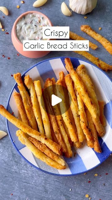 Pickles & Wine on Instagram: "Crispy Garlic Breadsticks  If you too love eating these crispy pre-meal garlic breadsticks, make them in 10 mins 😍  Ingredients:   3 TBSP Melted Butter 1 TBSP Coriander  Salt To Taste  1 TSP Chilli Flakes  1 TSP Garlic Powder (optional)  6-7 Bread Slices   Process:   Bake in Airfryer for 5 to 7 minutes at 180 degrees or until crispy  #bread #crispy #garlic #butter #breadstick #herb #recipe #recipes #easyrecipe   bread, crispy, sticks, recipe, recipes, easy recipe, easy recipes, Pickles and Wine" Salt Sticks Recipe, Bread Sticks Recipe Easy, 5 Min Snacks Easy Recipes, Garlic Bread Sticks, How To Make Dip, Crispy Bread, Crispy Garlic, Bread Sticks Recipe, Garlic Breadsticks