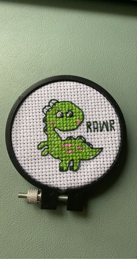 Tiny cross stitch dino I made! Cross Stitch Dinosaur, Tiny Cross Stitch, Tiny Cross, Cufflinks, Cross Stitch, Cuff