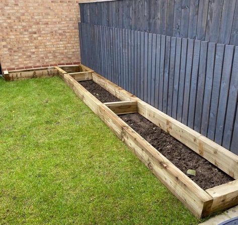 Sleeper Raised Beds Patio, Small Garden Raised Borders, Raised Flower Beds Sleepers, Wooden Sleepers Garden, Raised Flower Bed Front Of House, Sleeper Garden Beds, Raised Garden Borders, Black Fences In Garden, Garden With Sleepers