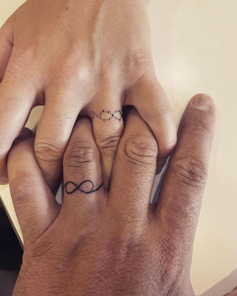 Get the Latest and trending different types of Couple tattoo design ideas here!!! Cute, Bold, Sexy Couple Tattoo Ideas. Couple Finger Tattoos, Couple Ring Finger Tattoos, Lifeline Tattoos, Love Finger Tattoo, Infinity Couple Tattoos, Finger Tattoos For Couples, Love Symbol Tattoos, Small Couple Tattoos, Ring Finger Tattoos