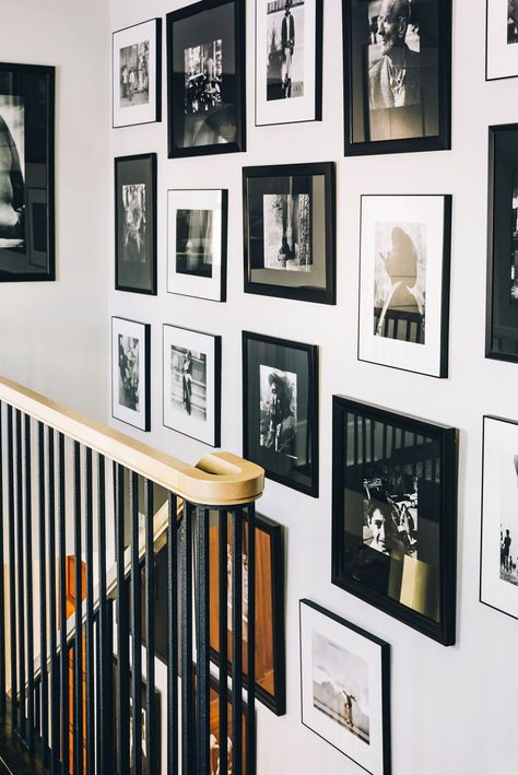 Where to Put a Gallery Wall in Your Home, According to the Experts Family Photo Gallery Wall, Gallery Wall Staircase, Picture Arrangements, Stone Fireplace Surround, Photo Wall Gallery, Farmhouse Remodel, Stair Case, Mother Art, Bold Wallpaper