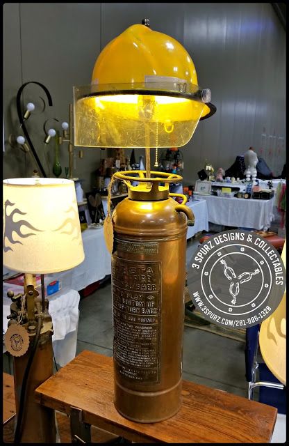 Fire Extinguisher Lamp, Fire Helmet Display, Fire Extinguisher Ideas, Fire Hose Crafts, Fire Department Decor, Fire Truck Room, Firefighter Room, Fire Crafts, Firefighter Home Decor