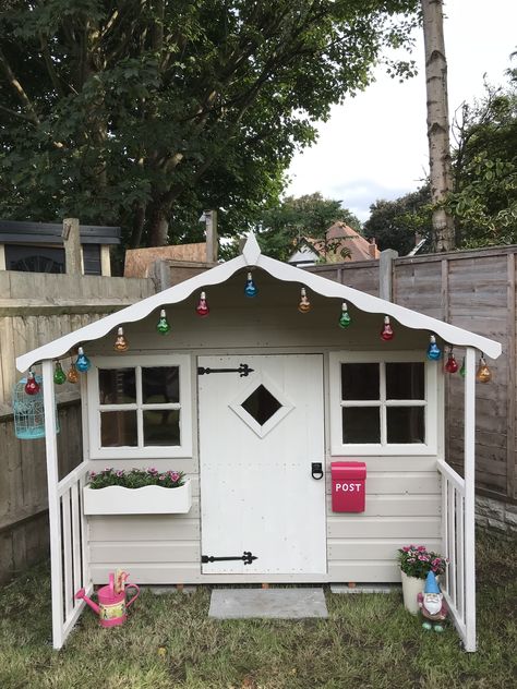 •Playhouse - Shire Cubby •Paint - Cuprinol in Natural Stone and Pale Jasmine  •Solar lights - Clas Ohlson •Post box - Bruka Design Pale Jasmine Cuprinol, Shire Playhouse, Outdoor Playhouse Paint Ideas, Painted Wooden Playhouse, Wooden Playhouse Makeover Interior, Playhouse Exterior Paint Ideas, Painted Wendy House, Wendy House Paint Ideas, Wooden Playhouse Paint Ideas