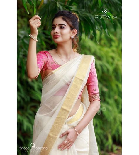 #Repost
///@rutwva_insta: There is no definition of beauty, but when you can see someone's spirit coming through, something unexplainable, that's beautiful..
.
The beauty of kerala saree blended with a subtle pink handembroidered pink blouse to bring in the joy of Vishu.
Muse: @nameetta 
Photography : @anoopupaasana_photography 
Makeup&hair : @parinayah 
Outfit : @rutwva_insta Kerala Saree With Pink Blouse, Onam Shoot, Set Saree Kerala, Onam 2024, Onam Sarees, Kerala Wedding Saree, Kerala Saree Blouse, Diwali Outfit, Onam Outfits