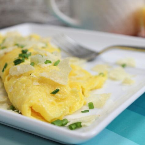 The Bear Omelet - Tiny Red Kitchen Crushed Potatoes, Omelets Recipe, Savory Cheese, Fluffy Eggs, Boursin Cheese, Potato Chip, Michelin Star Restaurant, Sandwich Shops, A Potato