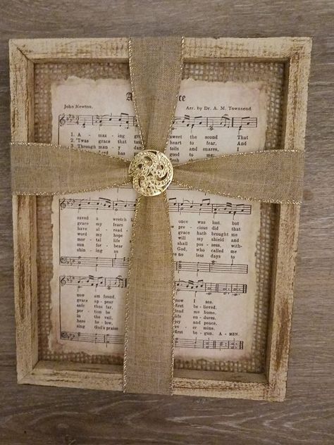 Dollar Tree Fanatics Crafts & Decor | I made this using a Dollar Tree canvas I took it apart painted the frame and then I added burlap behind it I printed Amazing Grace sheet music off the... | Facebook Dollar Tree Christian Crafts, Amazing Grace Sheet Music, Grace Sign, Dollar Tree Frames, Christian Signs, Grandmother Jewelry, Secret Sisters, Christian Crafts, Crafts Decor