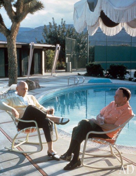 Actor Yul Brynner and Frank Sinatra chat poolside at the singer’s luxurious compound at the Tamarisk Country Club in Rancho Mirage, California. “The desert was Dad’s lifelong passion, the place where he felt healthiest and most peaceful,” Sinatra’s daughter Tina, once wrote. Purchased in the 1950s and adjacent to the country club’s seventeenth fairway, the two-and-a-half-acre property remained a family getaway until 1995. Old Hollywood Homes, Palm Springs Mid Century Modern, Palm Springs Home, Yul Brynner, Hollywood Homes, Famous Musicians, Old Hollywood Stars, Palm Springs California, Card Crafts