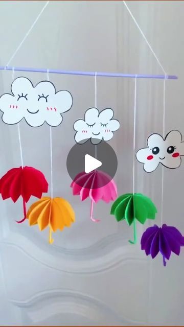 Itsy Bitsy Artsy I Art & Craft I Creative DIY on Instagram: "Craft hanging umbrellas and clouds from Paper ☁ ☔🌈 ✂️ Crafted with care, these DIY origami lighten eternal beauty into any space. Elevate your home decor with handmade elegance! 
.
.
📌Follow me for mor:
➡️ @itsy_bitsy_23
➡️ @itsy_bitsy_23
➡️ @itsy_bitsy_23
.
.
#PaperCraft #handmadedecor #HomeDecor #DIYDecor #CraftingInspiration #ArtisticCreations #holidaycrafts #CreativeCrafts #ArtisticExpression #CraftyIdeas #HandcraftedDecor #CraftyCreators #beautiful #origami #UniqueDecor #CraftyInspiration #DIYHome #ArtisticHome #kidsfuncrafts #HandmadeWithLove #CraftyCreators #umbrelladiy #handmade #homedecor #parentchildhandmade #craftymom #paperumbrella #papercrafting #craftingideas #craftykids" Paper Craft Umbrella, Diy Umbrella Decoration, Hanging Umbrellas, Umbrella Craft, Cloud Wall Hanging, Beautiful Origami, Paper Umbrella, Umbrella Decorations, Diy Clouds