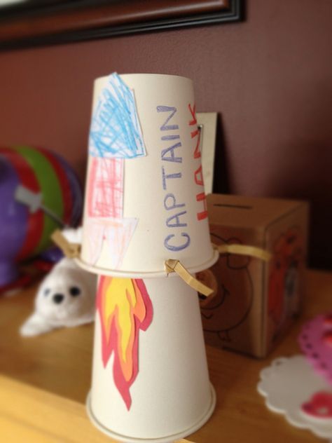 Paper cup and rubber band rockets. Push down on the top cup and it will jump up Flying Cup Rocket, Space Club, Fun Magazine, Space Preschool, Paper Cup Crafts, Space Crafts For Kids, Autumn Craft, Rockets For Kids, Space Activities