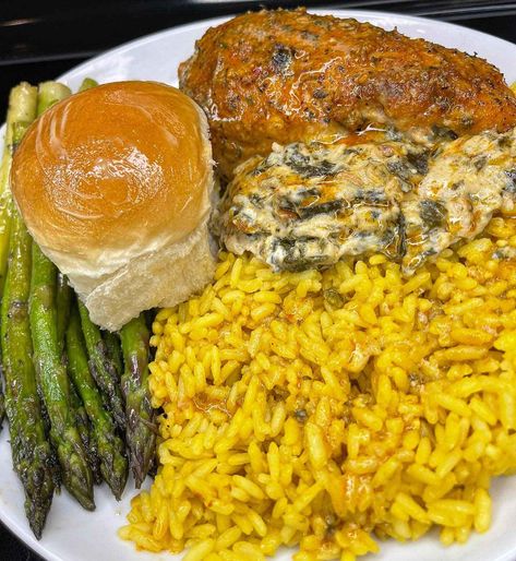 Juicy chicken breast stuffed with collard green dip, served with yellow rice, asparagus, and Hawaiian rolls. Collard Green Dip, Rice And Asparagus, Dinner Protein, One Pot Rice Meals, Green Dip, Green Dips, Oven Meals, Collard Greens Recipe, Collard Green