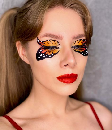 Butterfly Makeup Wings Red Lipstick Yellow Orange Red Brows Eyelashes Eyeliner Black White Highlighter Monarch Butterfly Makeup, Yellow Orange Butterfly, Fairy Halloween Makeup, Makeup Wings, Adriana Lima Lingerie, Bird Makeup, Fairy Costumes, Fairy Halloween, Butterfly Makeup