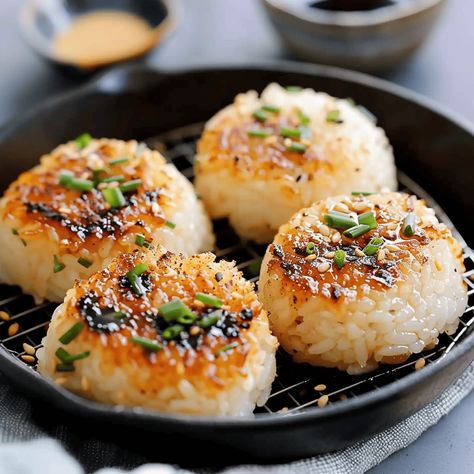 If you’re a fan of Japanese cuisine and looking for a twist on the classic rice ball, then this recipe for Miso Butter Grilled Rice Balls is just the adventure ... Read more Rice Balls For Kids, Rice Balls Recipe Japanese, Seaweed Rice Balls, Korean Rice Balls, Sushi Rice Balls, Healthy Japanese Food, Grilled Rice Balls, Miso Rice, Dorm Recipes