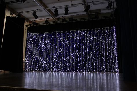 Glitter Curtains, Christmas Medley, Concert Stage Design, Dark Curtains, Blue Fountain, Light Backdrop, Church Stage Design, Church Stage, Christmas Concert