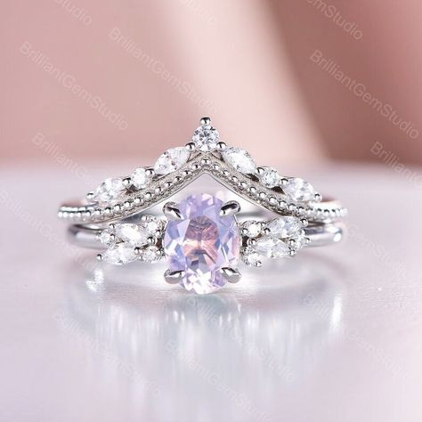 ☆Ring Details☆ Material: Solid 10K/14k/18k Rose Gold/White Gold/Yellow Gold (PLEASE choose silver or platinum if you are allergic to nickel.) ☆Engagement Ring☆ -Center Stone: Lavender Amethyst -Carat Weight: Approx 1.52 Ct. -Shape: Oval -Size: 6x8mm -Side Stone: Simulated Diamond / Moissanite -Shape: Marquise & Round -Band Width: 1.5mm ☆Wedding Band☆ -Stones: Simulated Diamond / Moissanite -Shape: Marquise & Round -Band Width: 1.5mm ☆Kind Tips☆ -The Silver ring material will be set with Simulate Amethyst Wedding Rings Set, Diamond Amethyst Engagement Ring, Amethyst Diamond Engagement Ring, Amethyst And Opal Engagement Ring, Purple Moissanite Engagement Ring, Light Purple Wedding Ring, Non Traditional Engagement Rings Purple, Amethyst Wedding Rings Silver, Lavender Amethyst Engagement Ring