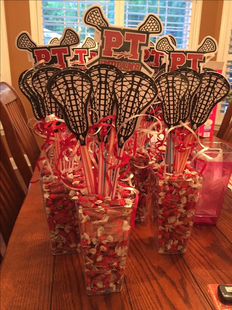 Peters Township Lacrosse Centerpieces -edible arrangements for the boys!! Lacrosse Team Snacks, Lacrosse Themed Party, High School Sports Banquet Centerpieces, Lacrosse Team Gifts, Senior Night Gift Ideas Lacrosse, Hockey Centerpieces Ideas, Senior Night Lacrosse Ideas, Lacrosse Centerpiece Ideas, Lacrosse Banquet Centerpieces