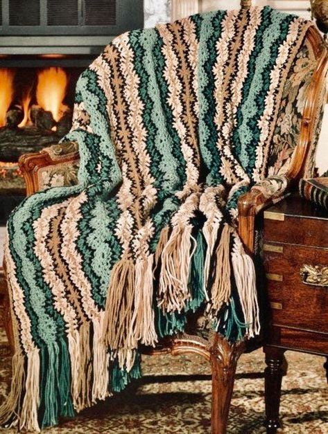 Buy 4 patterns and get 1 FREE. Add all 5 to your cart and enter the coupon code SAVE20 Stoke the fire in the hearth and then reach for this toasty throw before settling in with a good book. The warm hues will offer a welcome spot of color on a winters day. Approx finished size will be 41" X 69" Materials listed in the 2nd photo. This PDF pattern will be available for instant download from Etsy upon confirmation of your payment. File contains full color picture with easy to read instructions in E Vintage Crochet Pattern, Manta Crochet, Crochet Afghans, Hearth And Home, Vintage Afghan, Afghan Blanket, Leisure Arts, Yarn Sizes, Shabby Chic Cottage