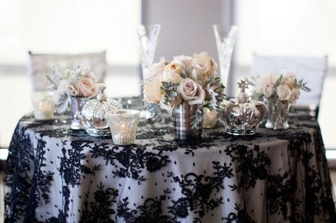 Van, thought u might like this idea. I know you are thinking of having white & black combination...  #cityclubLA Black Table Cloth, Wedding Reception Tablescapes, Silver Vases, Black Lace Wedding, Sweetheart Table Decor, Reception Tablescapes, Wedding Table Linens, Elegant Wedding Reception, Wedding Tablescape