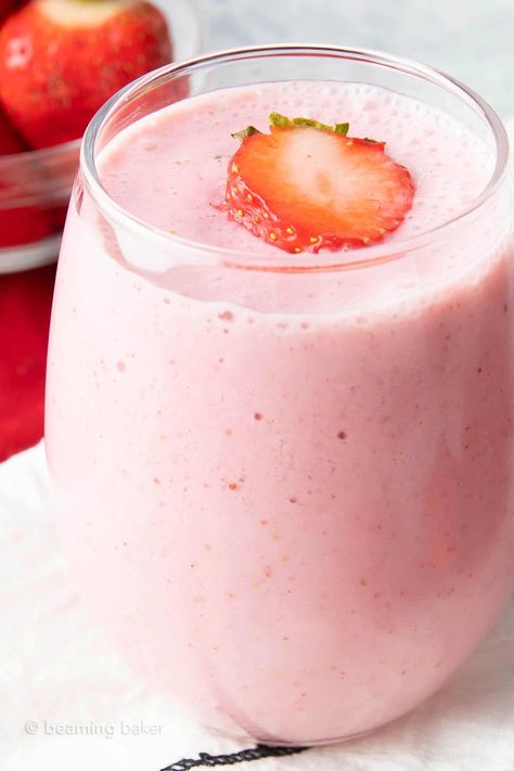 This simple and delicious strawberry smoothie is made with oat milk, soy or almond milk for a refreshing fruit-filled blended treat! | Recipe at beamingbaker.com Smoothie Recipes Oat Milk, Oat Milk Smoothie Recipe, Frozen Strawberry Smoothie, Soy Milk Smoothie, Smoothie Without Milk, Oat Milk Smoothie, Delicious Strawberry Smoothie, Milk Smoothie Recipes, Oatmeal With Almond Milk