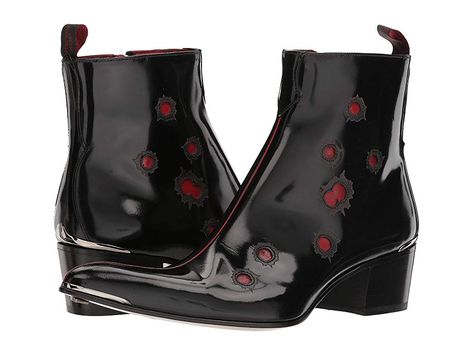 Jeffery-West Steel Zip Bullet Boot (Black/Red) Men's Boots. Go beyond the ordinary and mundane day-to-day by wearing the uniquely styled Jeffery-West Steel Zip Bullet Boot. Patent leather upper with bullet hole style accents. Inside zipper closure with back pull-tab. Pointed-toe silhouette with metal accent. Leather lining. Lightly padded red leather insole. Stacked heel. Leather sole with metal toe tap. Made in Spain. Measure #Jeffery-West #Shoes #Boot #GeneralBoot #Black Jeffery West, Bullet Hole, Shoes Boot, Men's Boots, Sneakers Boots, Metallic Accents, Free Clothes, Stacked Heel, The Ordinary