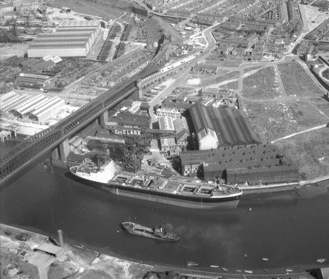 Aerial view of George Clark’s Engine Works, Southwick, August 1959 (TWAM ref. DT.TUR/22581C). To the west side of Queen Alexandra Bridge you can see part of the Southwick Shipyard of Austin & Pickersgill Ltd. The ore carrier 'Iron Ore', launched by Austin & Pickersgill Ltd, is at the Quay beside the Engine Works. This set of aerial images is intended as a short historical tour of the River Wear from the Piers to Pallion. It gives us an impression of what the River looked... Sunderland England, Pontoon Dock, South Tyneside, Durham County, North Shields, Marine Engineering, Cathedral Architecture, Aerial Images, Aerial Photograph