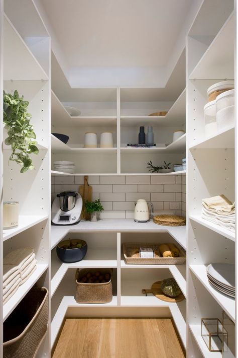 Homeowners Aidan and Lizzy have transformed their tiny 1960s U-shaped kitchen into a large, open and light-filled oasis with butler’s pantry and an adjoining laundry space. They have created a modern Hamptons feel by using Freedom Kitchens shaker style Sierra White Matt and Black cabinetry, Volpato handles, timber doors and oak flooring. In the heart of the space is a stunning Caesarstone® island benchtop in Statuario Maximus. Butler’s Pantry, U Shaped Kitchen, Butler Pantry, Butler's Pantry, Pantry Design, Kitchen Trends, Walk In Pantry, Kitchen Pantry, Kitchen Style