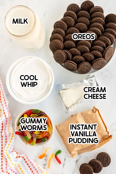 Fun Oreo dirt cups that are super simple to make and the perfect way to enjoy dirt and worms! Worms N Dirt Dessert, Fancy Dirt Cups, Dirt Pudding Recipe With Cream Cheese, Pudding Worms And Dirt, Dirt Pie Cups, Oreo Worm Dirt Cake, Graveyard Oreo Dirt Cake, Dirt Cup Dessert, Homemade Dirt Cups