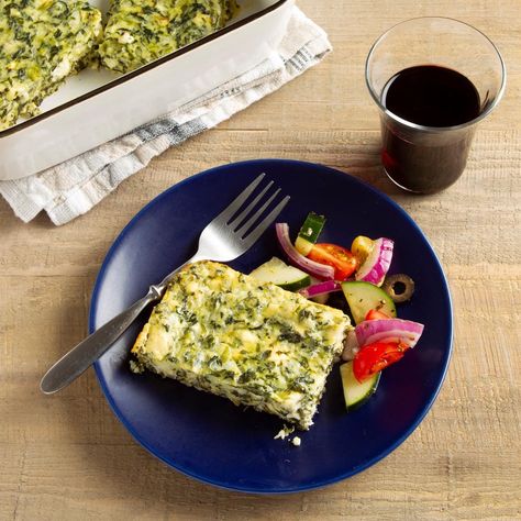 Spanakopita Casserole Recipe: How to Make It | Taste of Home Spanakopita Casserole, Comforting Casseroles, Zucchini Pie, Cheap Lunch, Spinach Bake, Spinach Casserole, Spinach Pie, Meatless Main Dishes, Egg Casserole Recipes