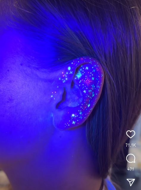 Uv Reactive Tattoos, Uv Ear Tattoo, Glow In The Dark Tattoo Ideas, Glowing Tattoos Fantasy Art, Glowing Tattoos, Fluorescent Tattoo, Uv Ink Tattoos, Uv Tattoos, Tattoo Making