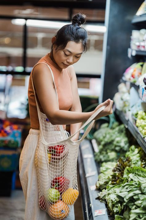 Woman Buying Groceries in a Supermarket · Free Stock Photo Mesh Bags, Plastic Shopping Bags, Sustainable Shopping, Model Inspo, Buying Groceries, Urban Farming, Human Connection, Reusable Shopping Bags, Grocery Shop