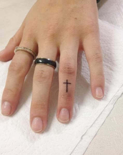 Jesus Finger Tattoo, Cross Finger Tattoos For Women, Finger Tattoos Cross, Christian Finger Tattoos, Cross On Finger Tattoo, Elegant Finger Tattoos, Cross Finger Tattoo, Family Sleeve Tattoo, Cross Finger Tattoos