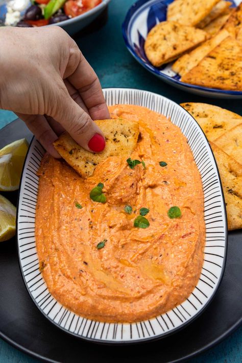 Your new favorite cold dip. Tyrokafteri is a tangy, salty, zesty and delicious 5-minute 5-ingredient Greek spicy feta dip. Perfect for mezze platters, appetizers & more! Fire Feta Recipe, Greece Themed Party, Spicy Feta Dip, Greek Appetizer, Spicy Feta, Greek Appetizers, Greek Dinners, Spicy Dip, Hot Cheese