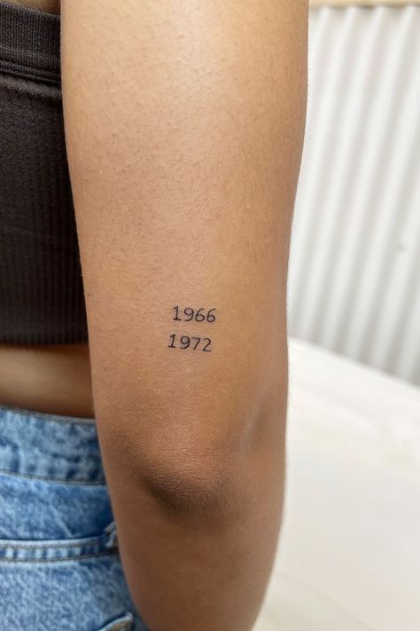 Sister Birth Year Tattoos, Birth Year Tattoo Arm, Small Year Tattoos, Small Years Tattoo, Dainty Birth Year Tattoo, Birthyear Tattoo On Arm, Parents Year Tattoo, Tattoo Ideas For Your Parents, Two Dates Tattoo